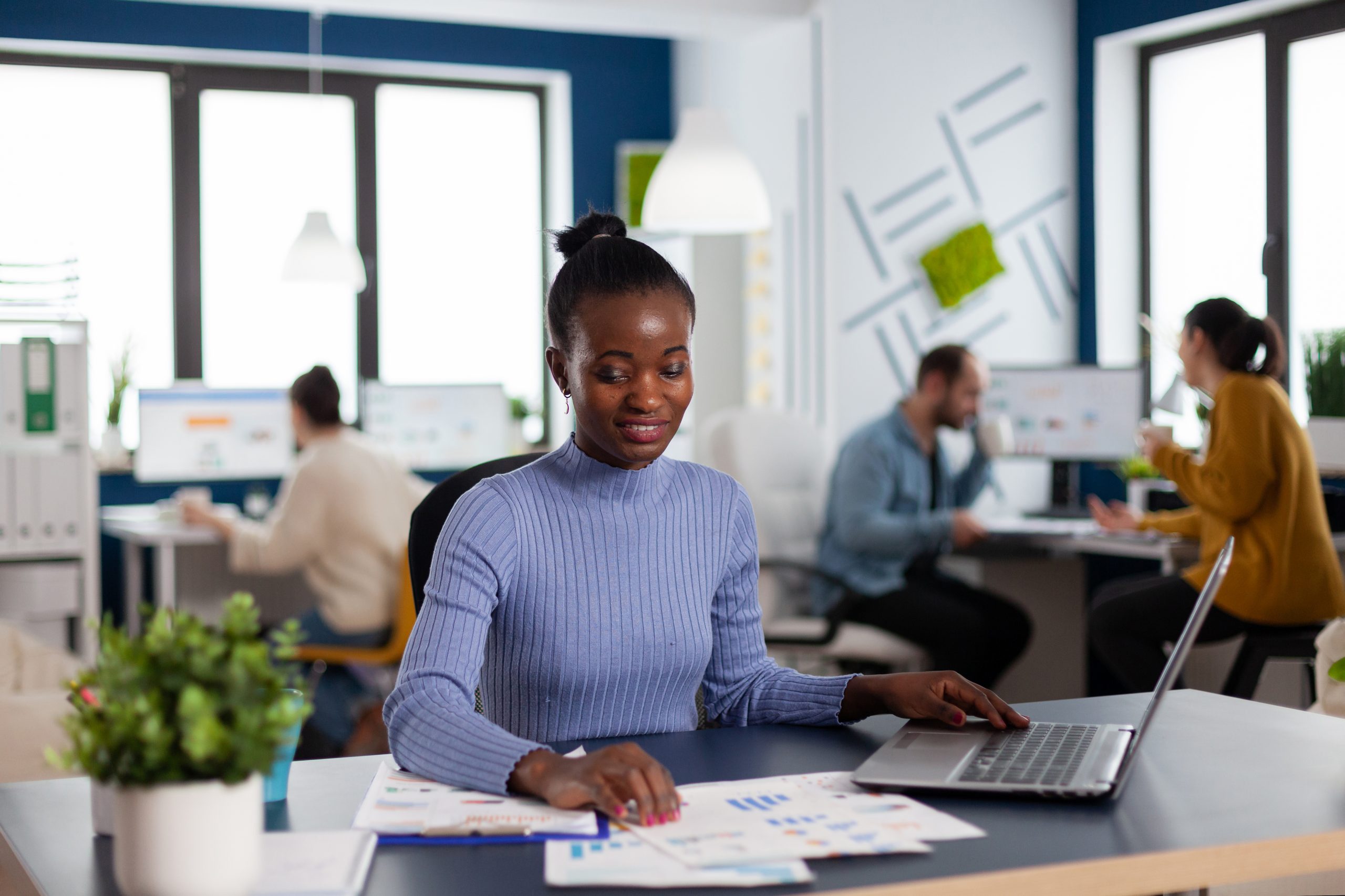 african-in-marketing-corporate-office-working-to-f-2022-01-19-00-09-43-utc-scaled-1