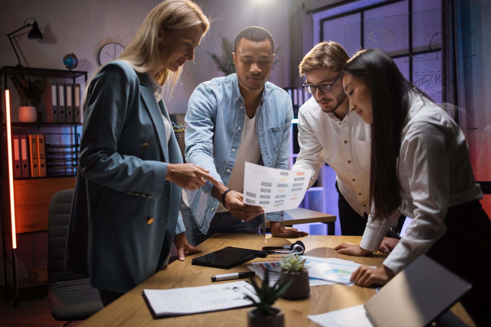 business-team-of-four-brokers-discussing-financial-2021-12-09-02-45-41-utc-1-scaled-1