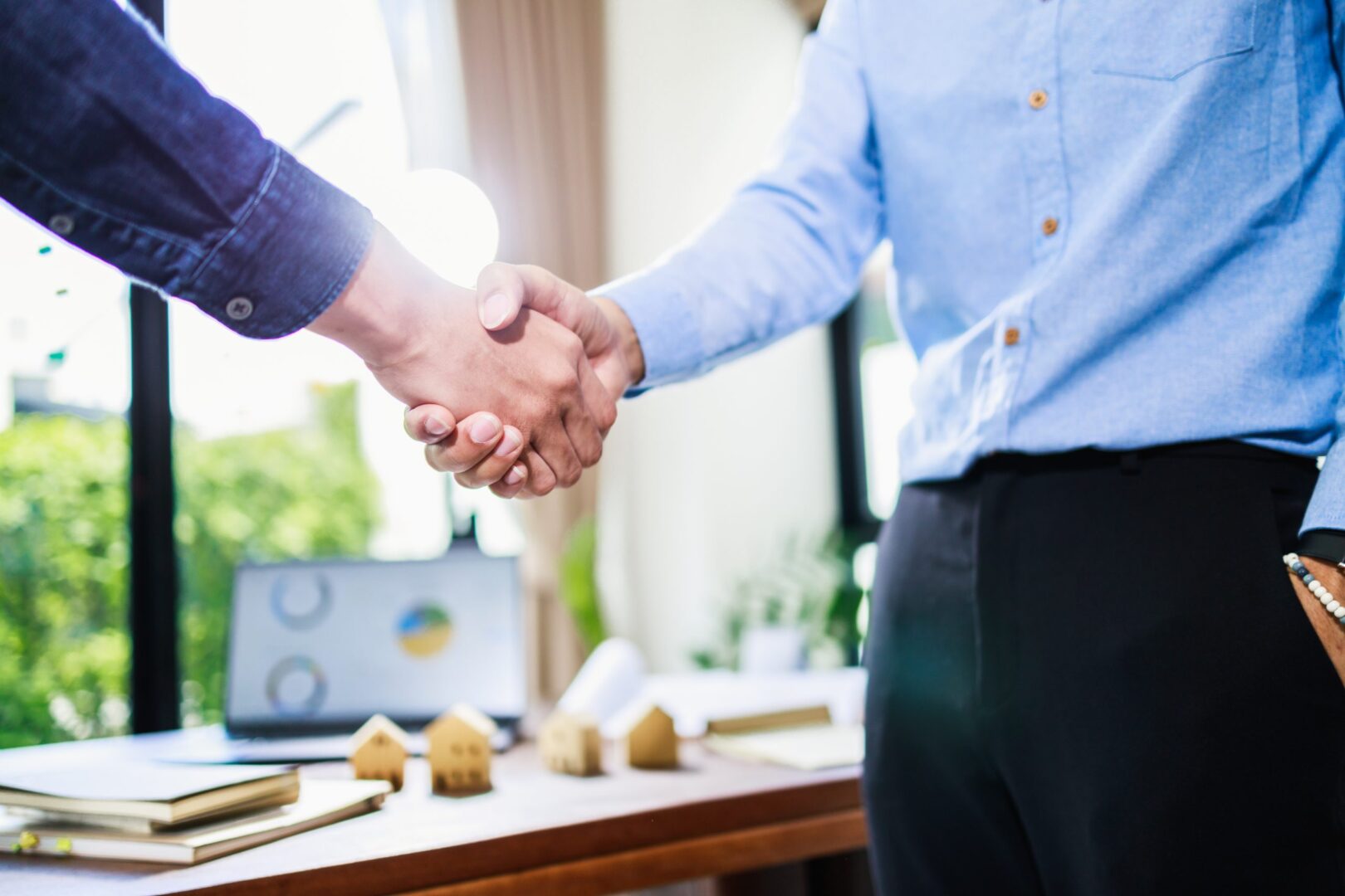 real-estate-agent-handshake-deal-business-busine-2022-07-08-18-05-28-utc-scaled-1