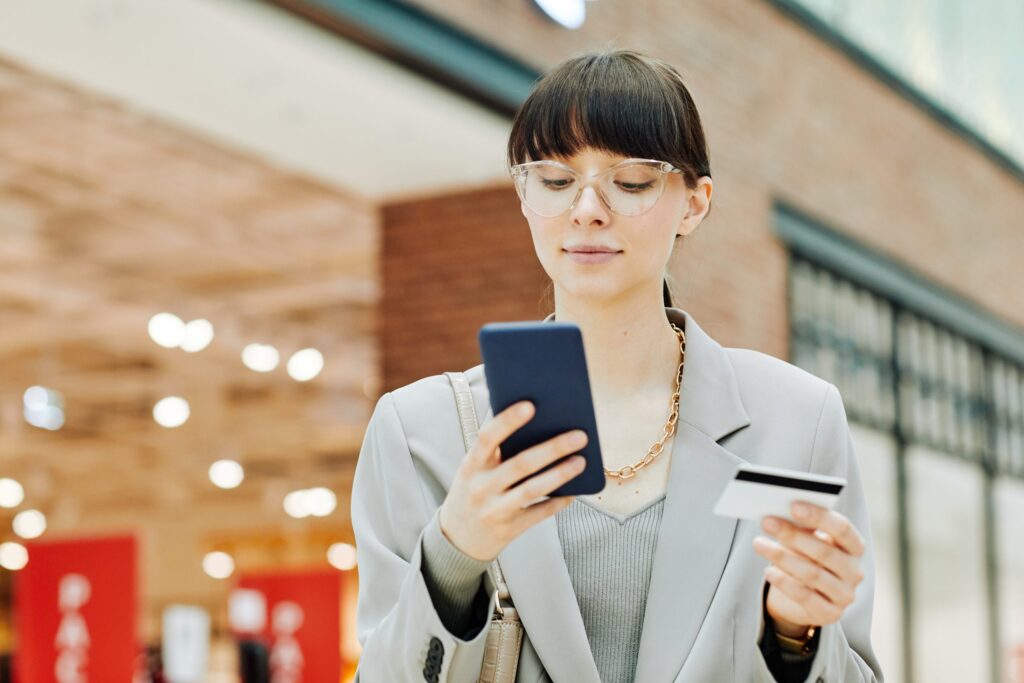 young-woman-shopping-in-app-2022-04-11-14-16-00-utc-1-scaled-1